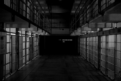 State vows tough action in prison officials' attack