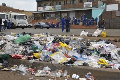 We need our salaries, not food parcels, waste workers plead