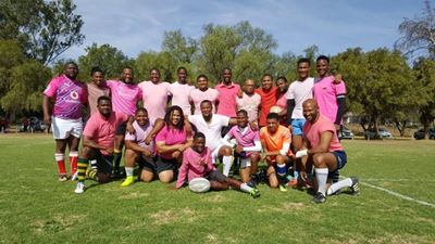 Rugby team goes pink to support cancer fighters
