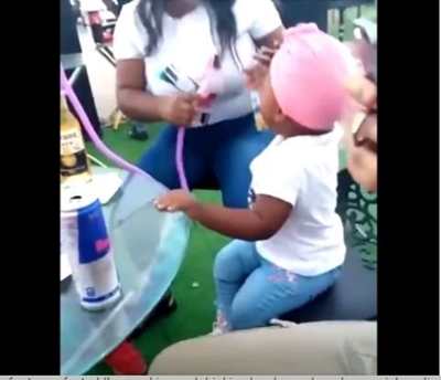 WATCH: Shocking video of toddler smoking, drinking goes viral on social media