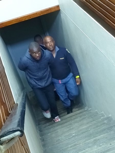 Murder accused ‘smiles’ after arrest