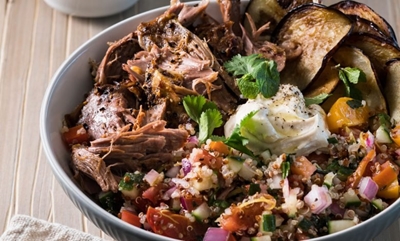 Slow-cooked, pull-apart fragrant lamb with quinoa, herb and tomato salad