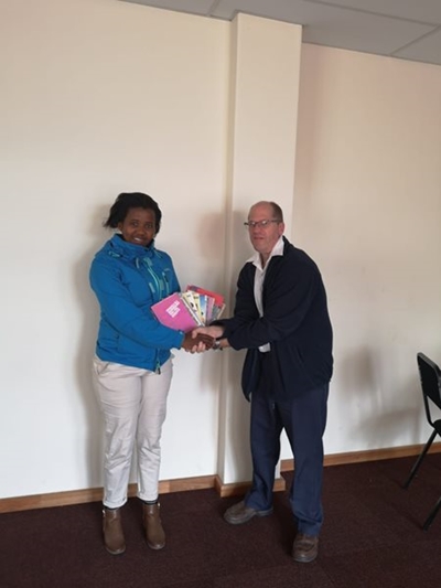 Library donates books to reading club