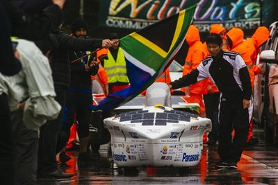 Sun-powered vehicles defy a rainy day race