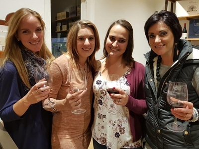 Locals enjoy wine and nibbles