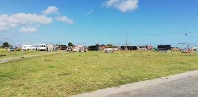 Protesgangers terug huistoe om te bou