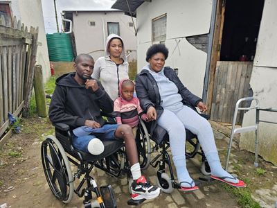 Building collapse survivors waiting for help