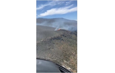 Helicopter deployed as wildfire erupts in Uniondale Mountains