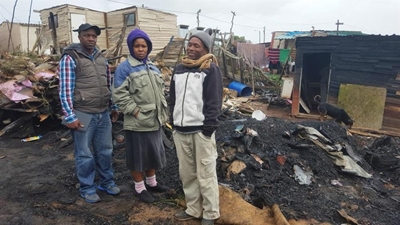 Fire razes home and church