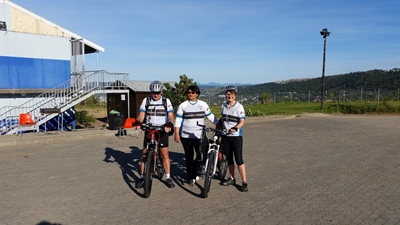 Woman cycles for primary school