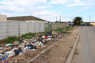 Illegal dump, missing paving at Mossel Bay FCS still an issue
