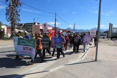 Silent walk in Thembalethu highlights fight against illegal dumping