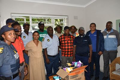SAPS soccer team, local businesses hand over sanitary pads