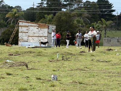 Excavator truck torched during land invasion
