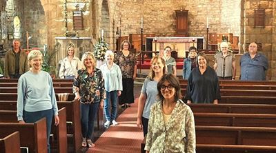 Afskeid in harmonie: Eden Camerata eer koorleier