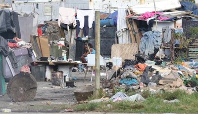 Business flees as Knysna encampment crisis deepens