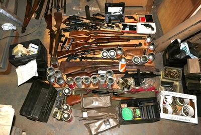 Police find arms cache in a warehouse, ex-German citizen nabbed