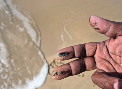 Oil contamination on beaches being cleaned up 