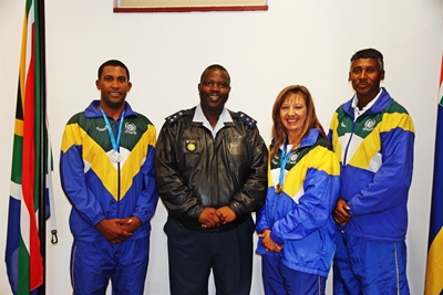 Local police officers bring back gold
