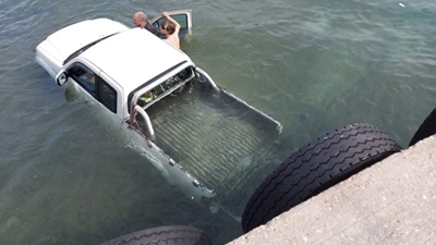Bakkie lands in water at harbour