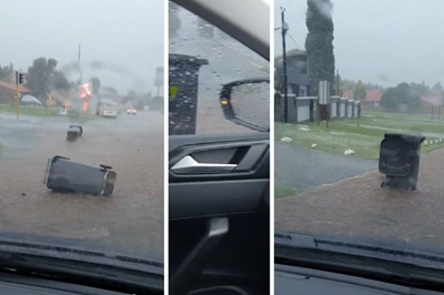 ‘Indicate, wena!’ – Driver dodges speeding dustbin on flooded street