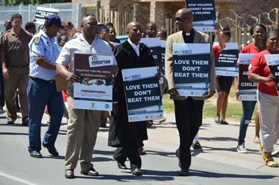 Men march in heels