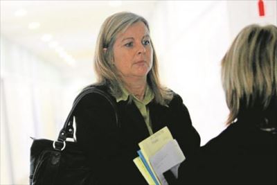 Woman gets six years for stealing millions from school