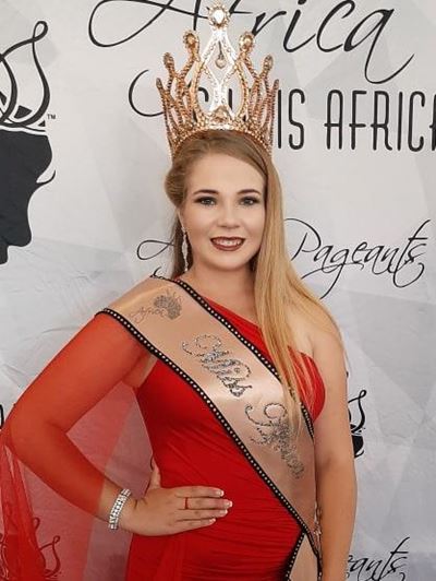 Ravishing lady in red wins title