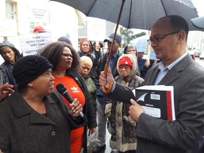 Locals picket against non-local appointment