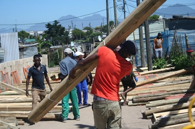 Fire victims receive building materials