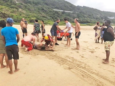 Locals save 5 from drowning