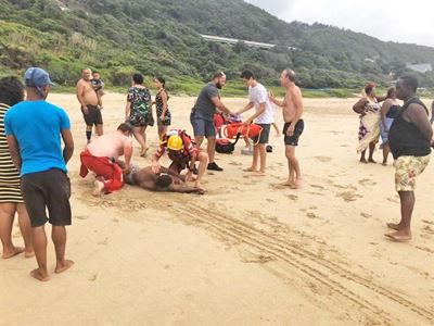 Locals save 5 from drowning