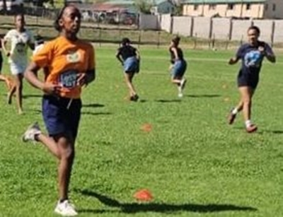 Girls taught basics of rugby