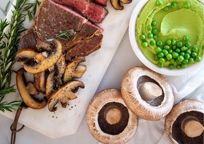 Sautéed Portabellos, Steak, Coriander Mash and Pea Purée 