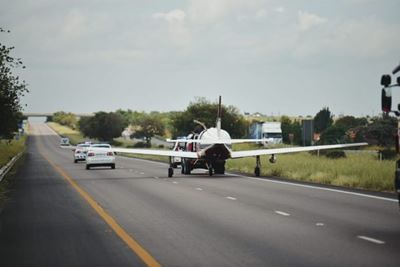Light aircraft makes emergency landing on highway