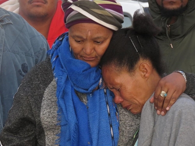 Racial tension flares after mob murder