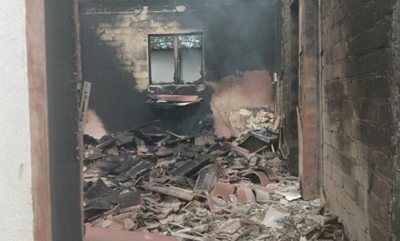 Mother throws child out of window before burning to death 