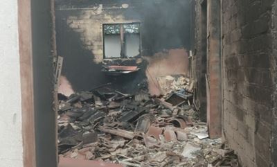 Mother throws child out of window before burning to death 