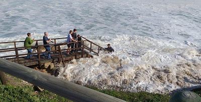 Angler washed to sea, still missing