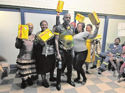 Tsengwa hands out shoes