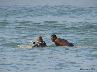 Teen surfer saves swimmer