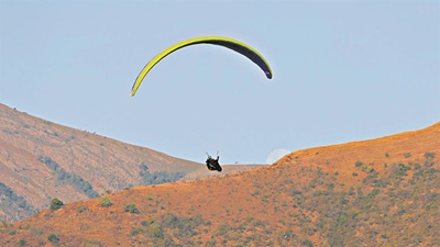 Local couple shine at paragliding champs