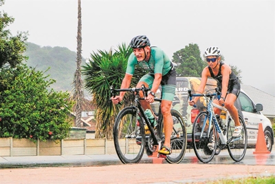 Triathlon athletes not scared of a little rain