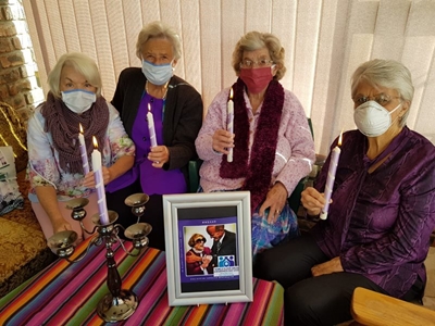 Elderly women commemorate quietly