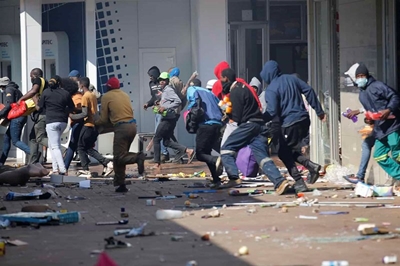 A looting shock to SA’s economic recovery – economists