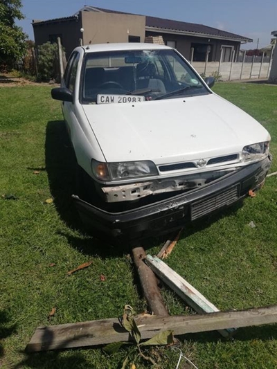 Five injured as truck overturns