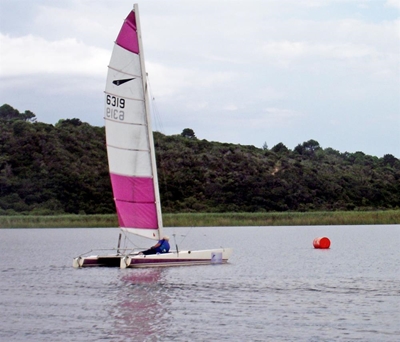 Wind plays cat and mouse with sailors on Island Lake
