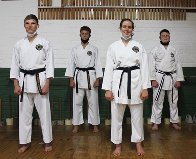 Black belts kick the virus