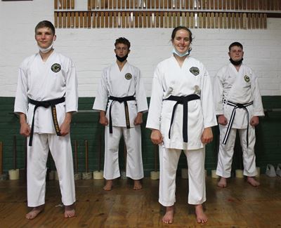 Black belts kick the virus
