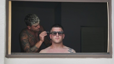 To cut or not to cut? In US, quarantine slows everything but hair growth